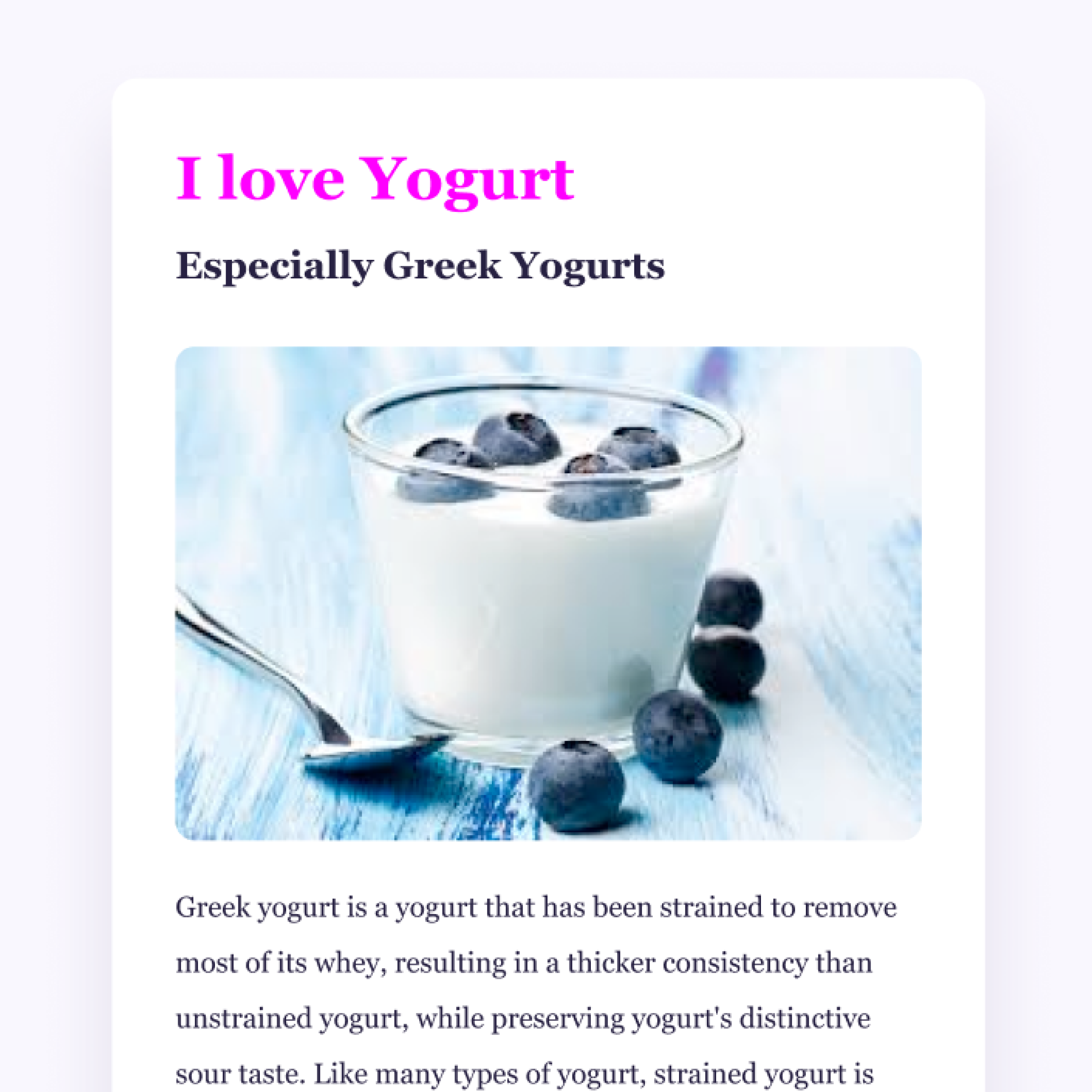 image of glass bowl filled with white yoghurt and 4 blueberries. On the right side 4 additional blueberries are positioned and on the right a spoon. Everything is placed on a blue wooden counter.